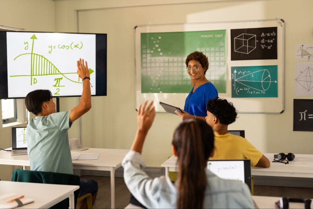 Interactive classroom with students engaged in learning math concepts.