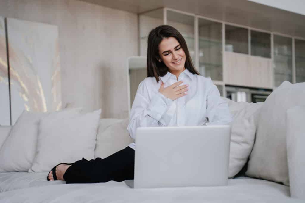 Confident teacher glad to receive compliment from a parent who emailed her.