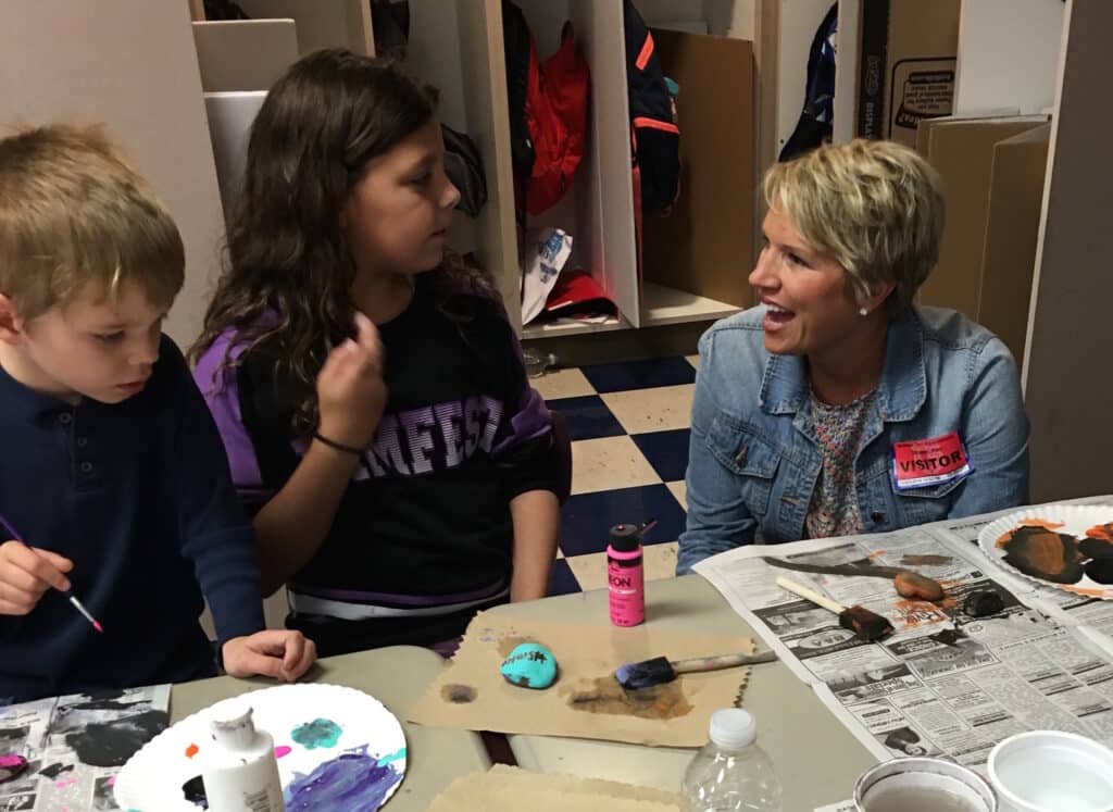 Kim Strobel with students