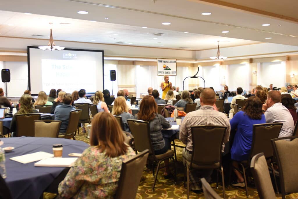 Kim Strobel facilitating an impactful workshop at an education event