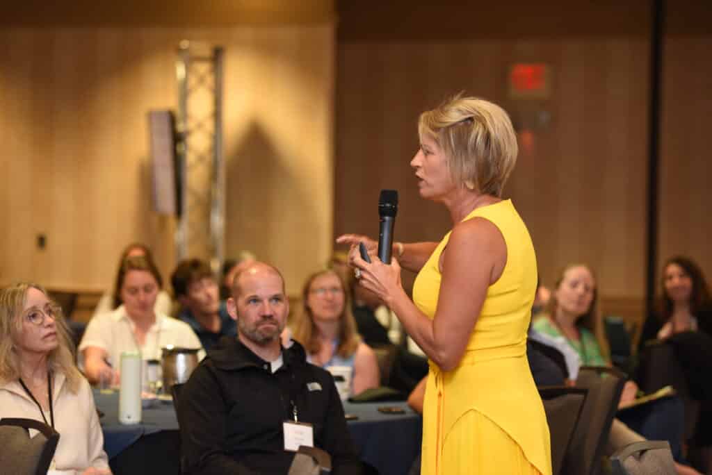 Kim Strobel presenting at a live workshop for a group of educators