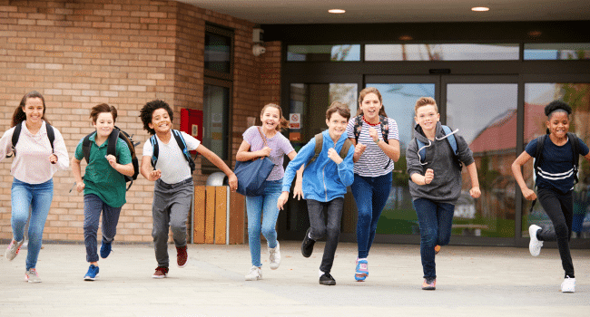 happy kids going out to school