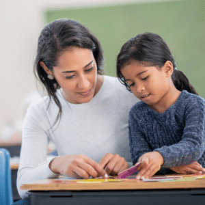 teacher with a student doing activity