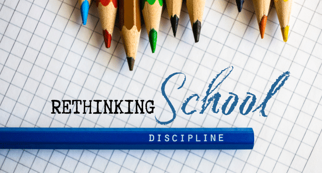Colored pencil and paper with text "Rethinking School Discipline"