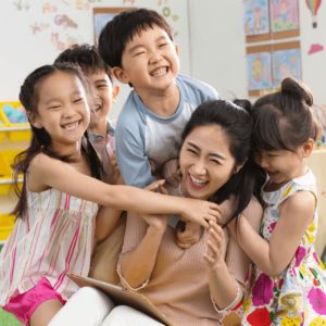 Teacher having fun with students.