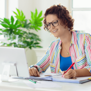 women teacher in front of computer