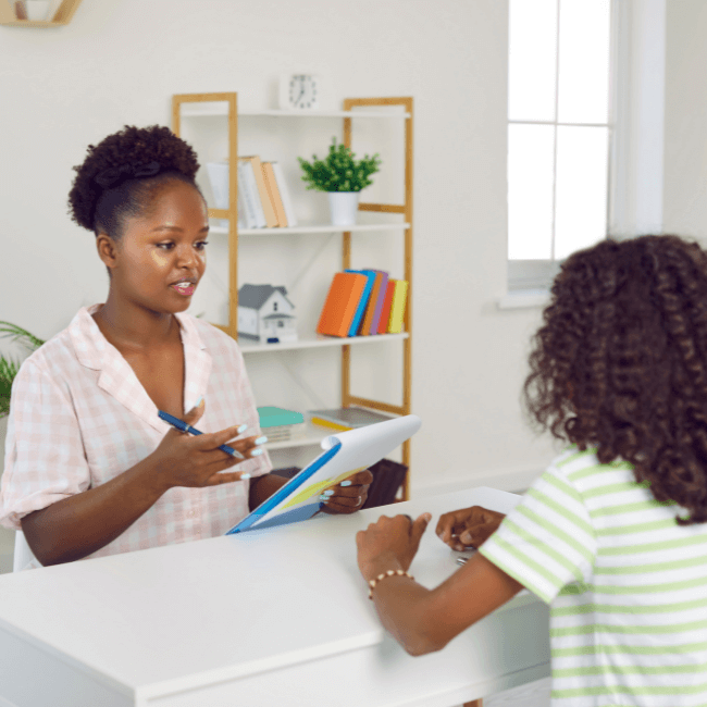 Teacher counseling with student.